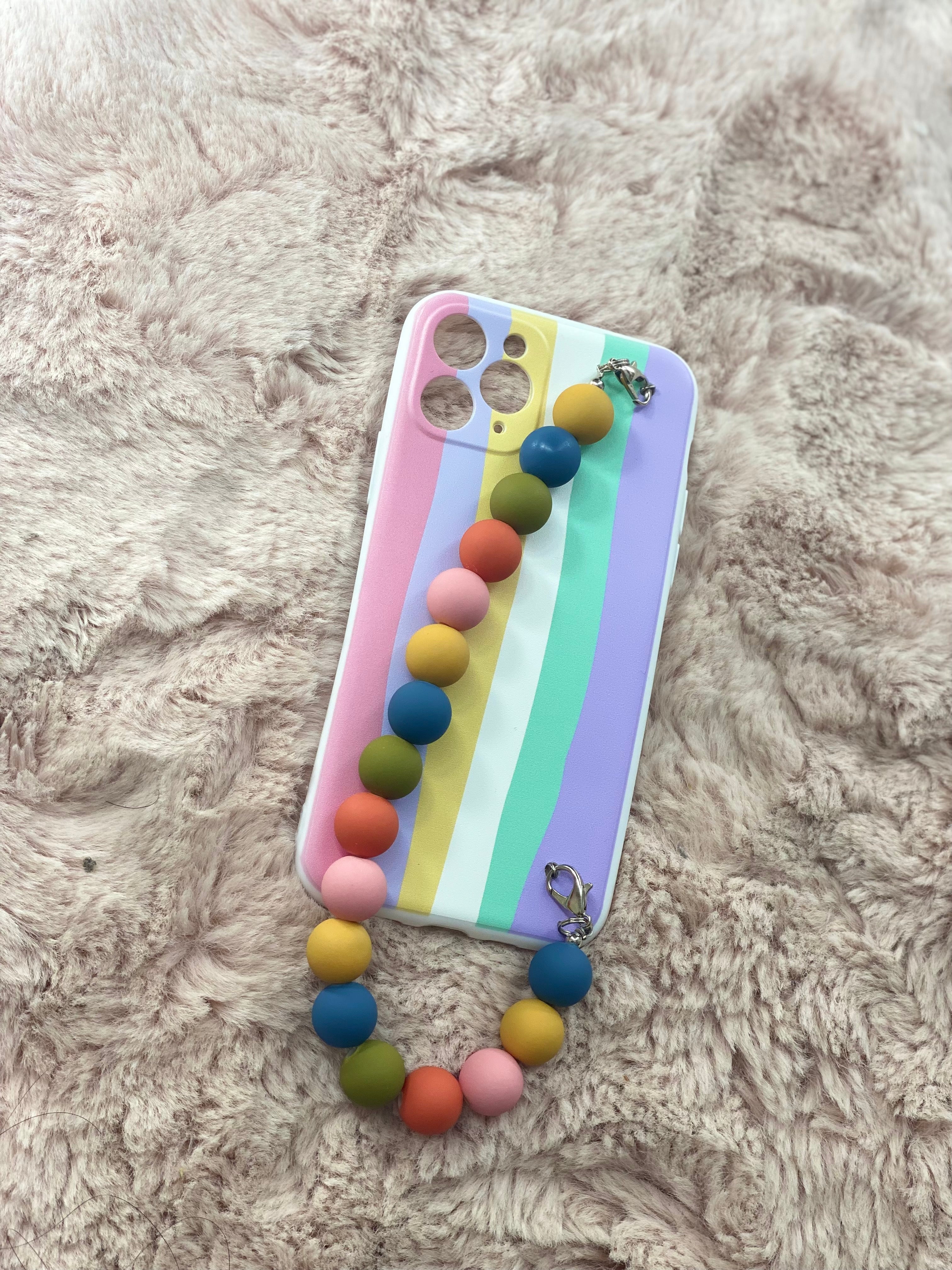 Funda iPhone arcoíris con caramelo